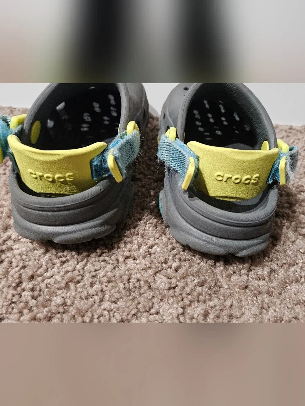 CROCS Kids Gray Clogs with Yellow and Blue Accents